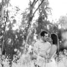 Passionate couple kissing during their Los Angeles engagement photoshoot.