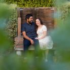 Couple laughing during their Venice Canals engagement photoshoot.