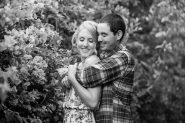 Couple embracing and laughing at their Goleta engagement photoshoot.