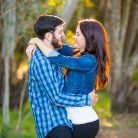Engaged couple embracing during their Coronado Butterfly Preserve engagment session.