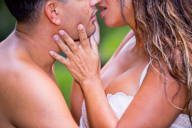 Close up of couple passionately kissing during couples boudoir photoshoot