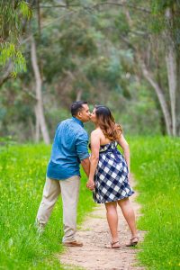 Couple kissing during an engagement photoshoot.