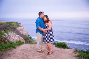 Couple kisses on the Ellwood Bluffs.