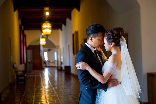 Bride and groom take photos at the Santa Barbara Courthouse.