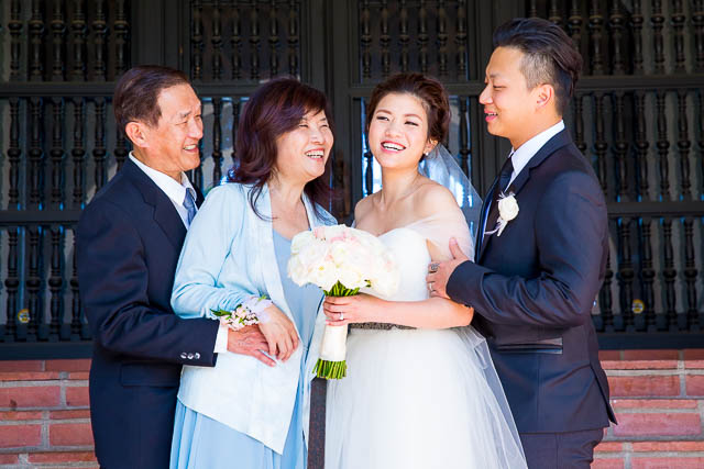 Family photos are taken on the red stairs at the Santa Barbara Courthouse.