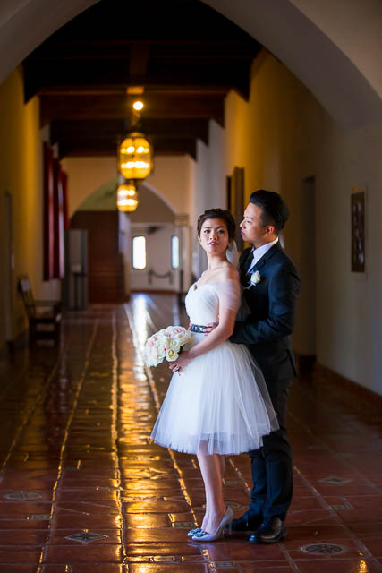 Bride and groom pose at the Santa Barbara Courthouse.