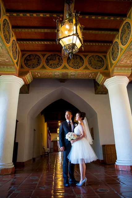 Bride and groom pose at the Santa Barbara Courthouse.