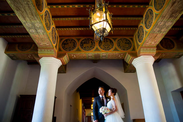 Bride and groom pose at the Santa Barbara Courthouse.