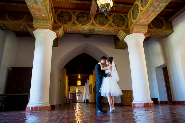Bride and groom pose at the Santa Barbara Courthouse.