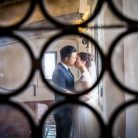 A couple kisses at the Santa Barbara Courthouse.