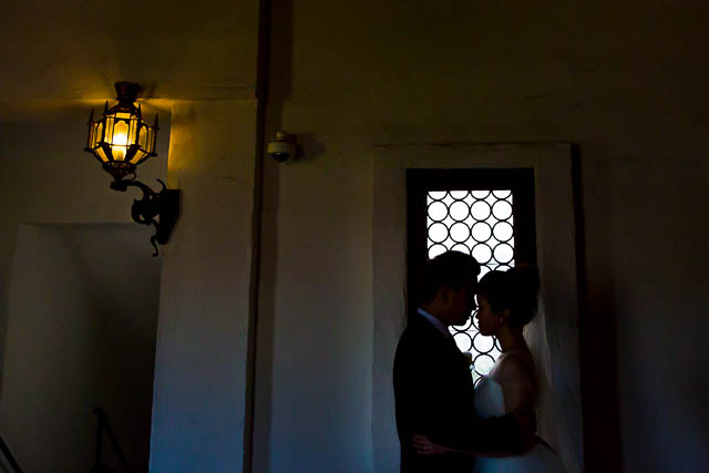 Elopement photos of the bride and groom at the Santa Barbara Courthouse.