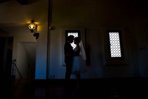 Elopement photos of the bride and groom at the Santa Barbara Courthouse.