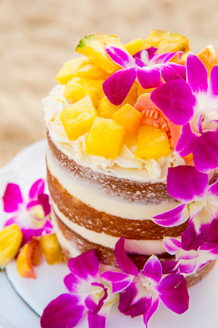 Hawaiian themed naked wedding cake on Lanikai Beach
