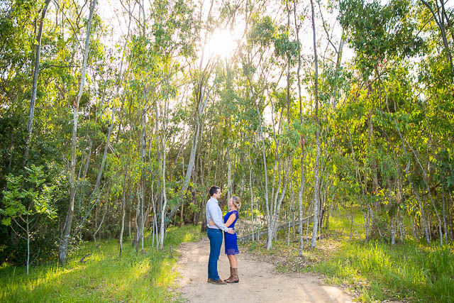 The couple overlooks the trees during their Santa Barbara engagement photos.