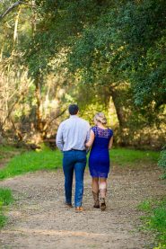 Couple embracing and laughing at their Goleta engagement photoshoot.