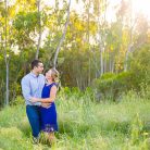 Couple embracing and laughing at their Goleta engagement photoshoot.