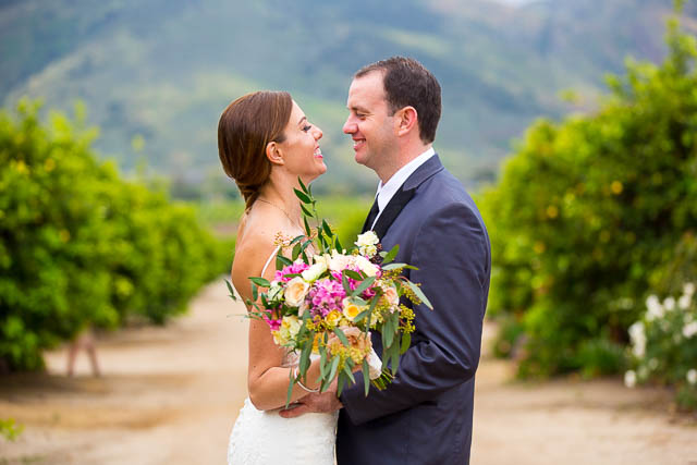 Bride and groom kissing at Gerry Ranch wedding.