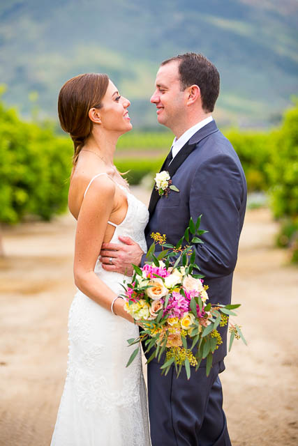 Bride and groom kissing at Gerry Ranch wedding.