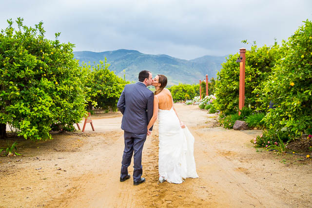 Bride and groom kissing at Gerry Ranch wedding.