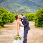 Bride and groom kissing at Gerry Ranch wedding.