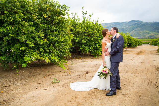 Bride and groom kissing at Gerry Ranch wedding.