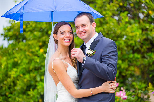 The couple posing for photos at their Gerry Ranch wedding in Camarillo.