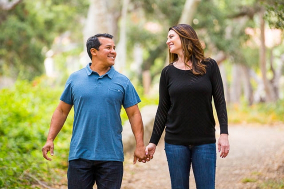 The newly engaged couple looks at each other lovingly during their Ennisbrook engagement photos.