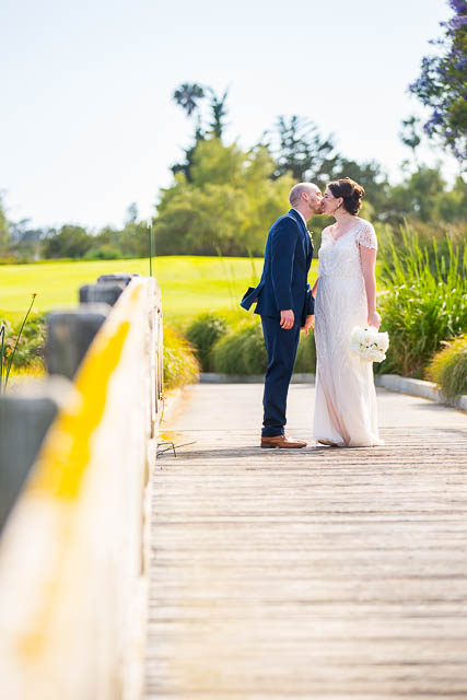 Bride and groom holding each other at Glen Annie Golf Course wedding.