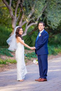 Romantic photos of the bride and groom at San Ysidro Ranch's lavender field.