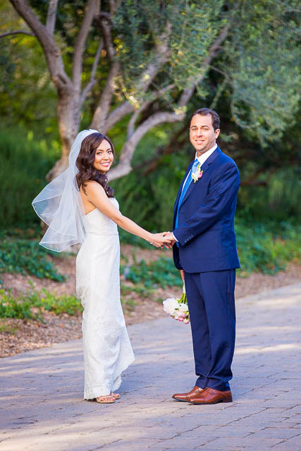 Romantic photos of the bride and groom at San Ysidro Ranch's lavender field.