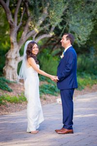 Romantic photos of the bride and groom at San Ysidro Ranch's lavender field.