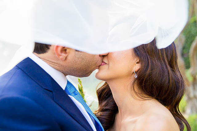 Romantic photos of the bride and groom at San Ysidro Ranch's lavender field.