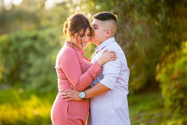 Couple holding hands during their Montecito engagement photos.