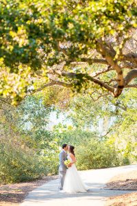 Romantic photos of the bride and groom after their Elings Park wedding.