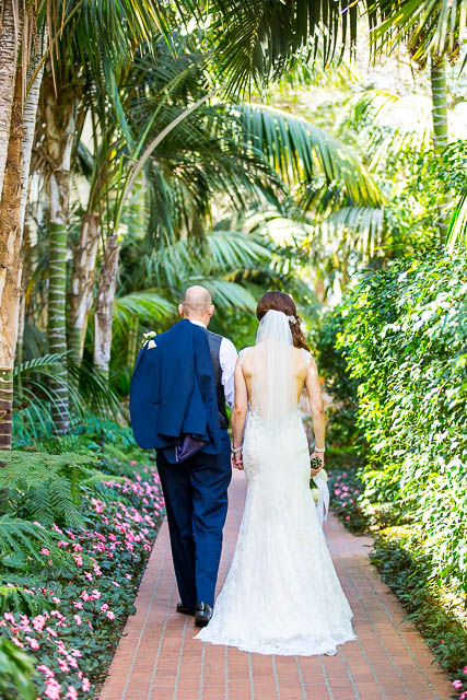 The newlyweds strolling in the Biltmore's gardens.