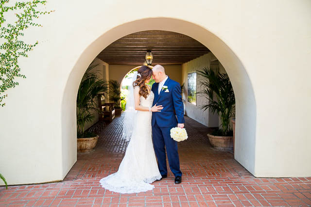 The newlyweds kissing at the Biltmore.