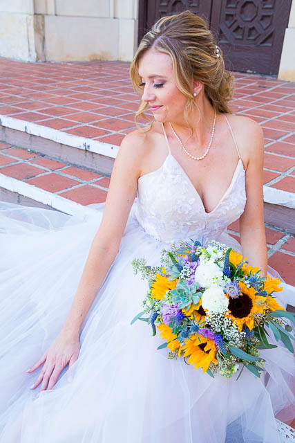 The bride posing for the camera.