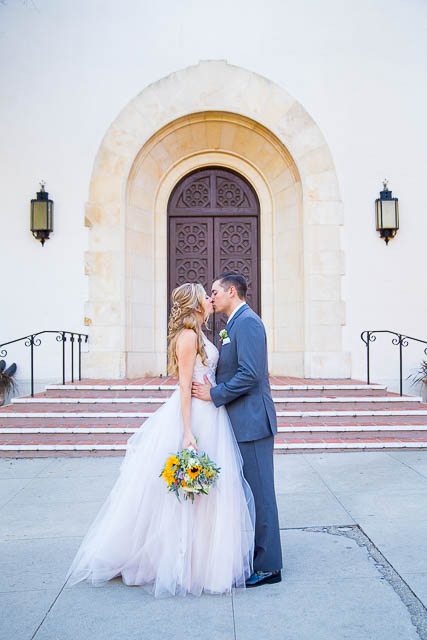Bride and groom kissing at The Unitarian Society wedding.