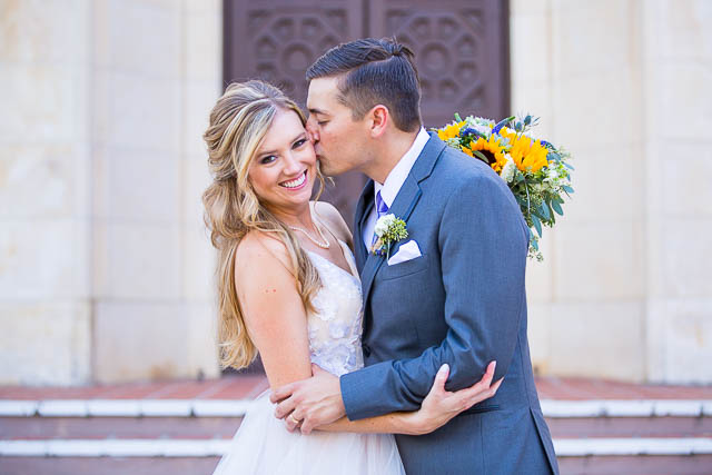 Bride and groom kissing at The Unitarian Society wedding.