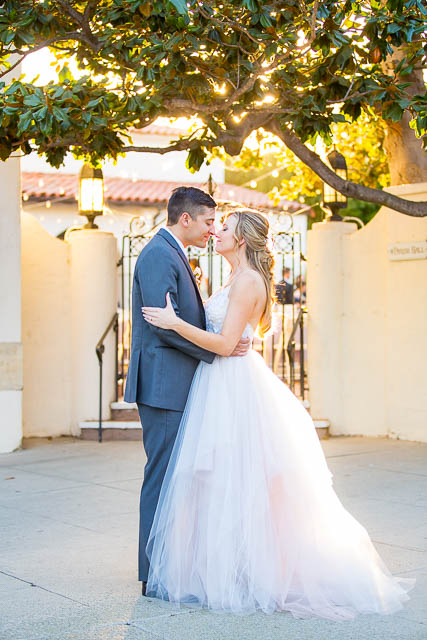 The bride and groom in front of the Unitarian Society of Santa Barbara.
