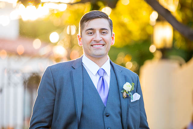 The groom posing outside the Unitarian Society of Santa Barbara.