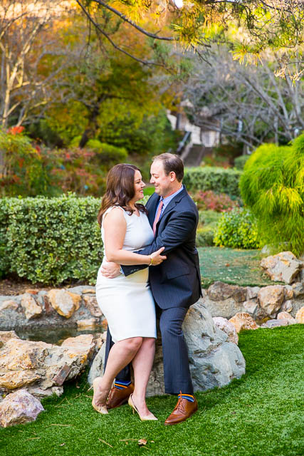 Bride and groom holding each other at the Langham Hotel Pasadena by the pond.