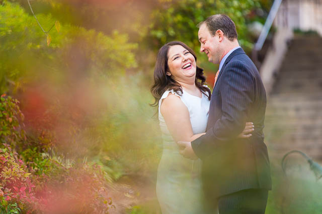 Couple laughing at the Langham Hotel Pasadena engagement photoshoot.