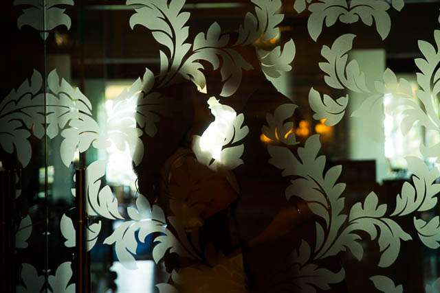 Bride and groom taking unique photos at the Langham Hotel Pasadena.