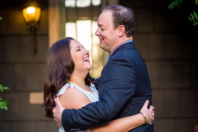 Couple laughing at the Langham Hotel Pasadena engagement photoshoot.