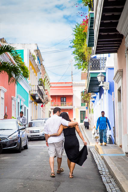 Stylish engaged couple walking in Old San Juan, Puerto Rico.