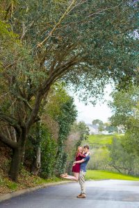 Newly engaged couple at the Hans Christian Andersen Park in Solvang, California.