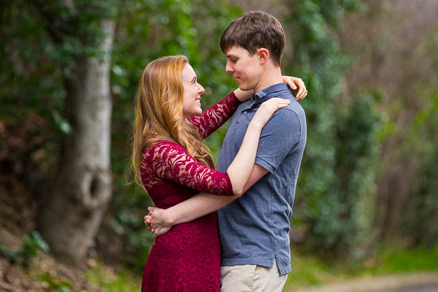 A couple at their engagement photos at the Hans Christian Andersen Park in Solvang, California.