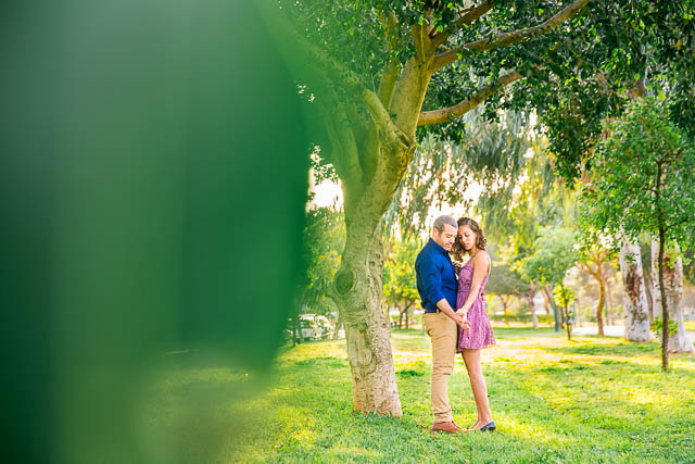 The bride holding her groom at the Yarkon Park in Tel Aviv, Israel.