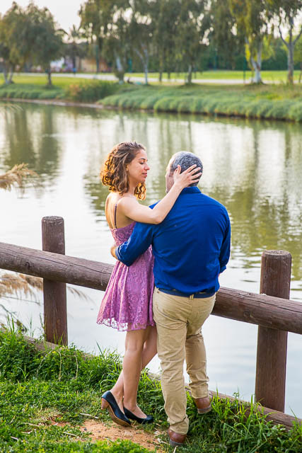 The bride holding her groom at the Yarkon Park in Tel Aviv, Israel.